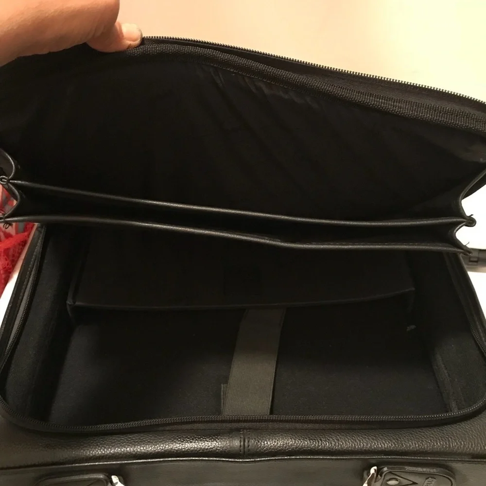 Dell laptop and office briefcase 💼